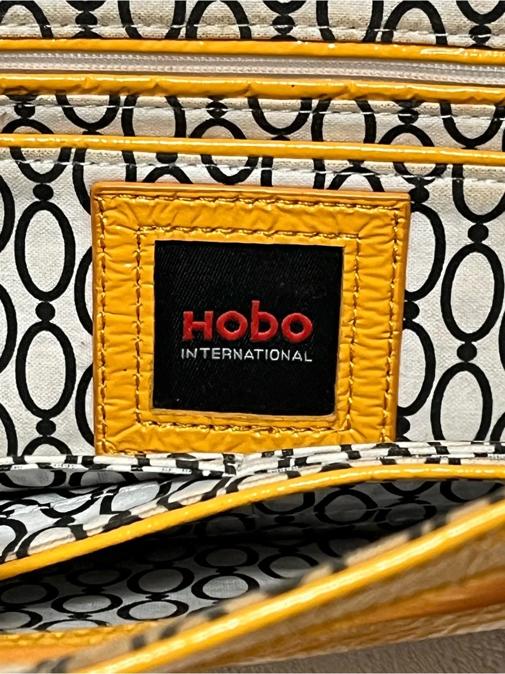 HOBO International Y2K Katrina Mustard Patent Leather Clutch